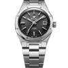 Swiss automatic watch with matte black basketweave dial and integrated steel bracelet