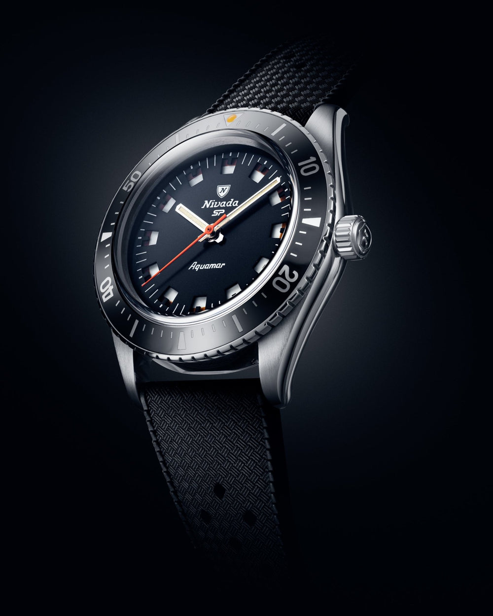 Aquamar Black automatic dive watch with black dial and textured black strap, angled close-up