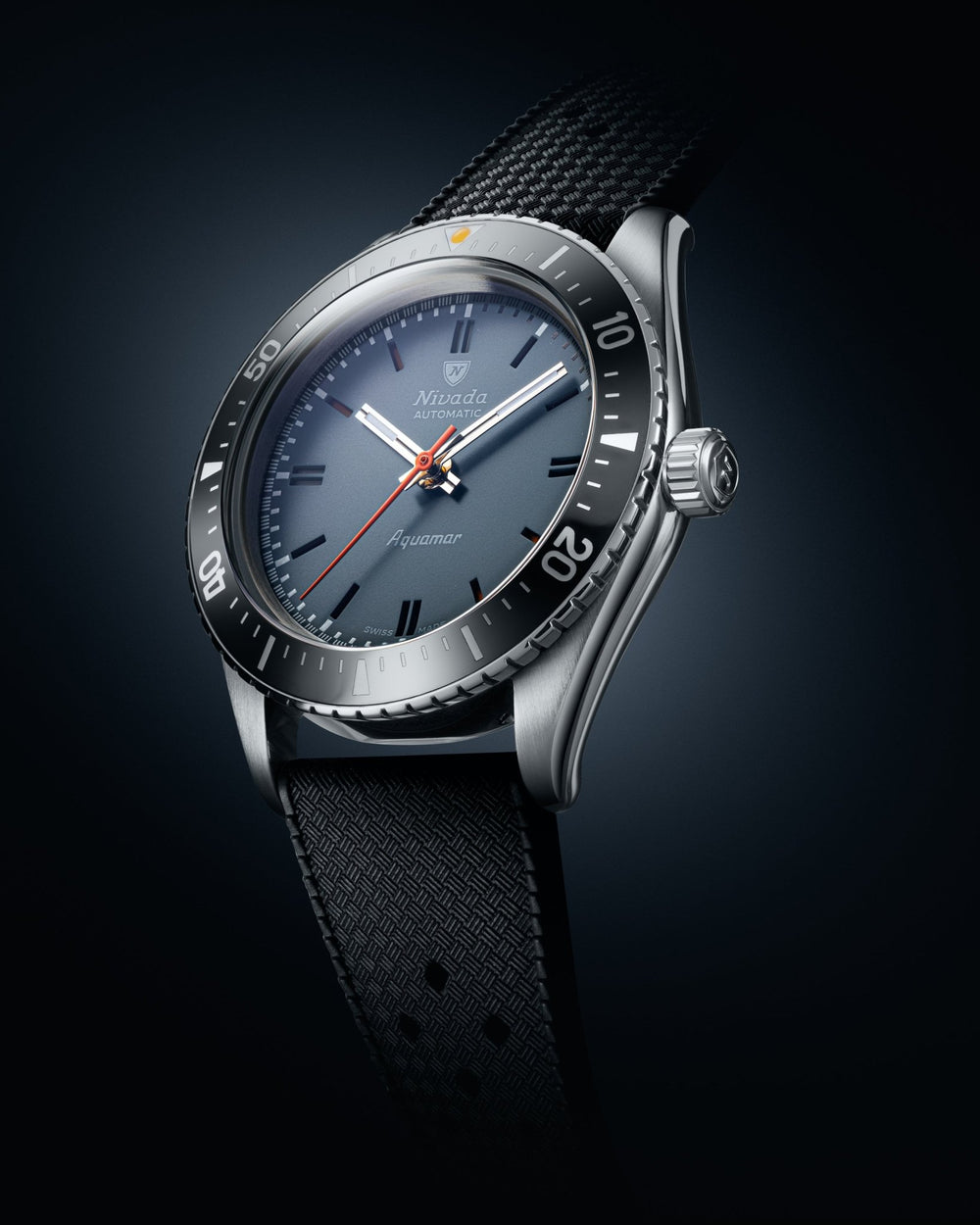 Nivada Grenchen Aquamar Grey automatic watch with black bezel and textured black strap, angled view