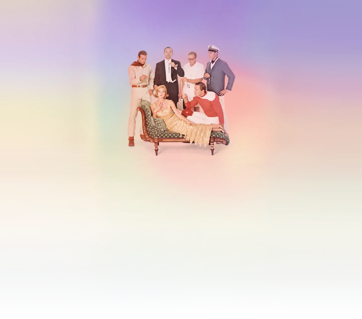 A 1960s scene: a woman in a gold dress on a green chaise longue, surrounded by five men
