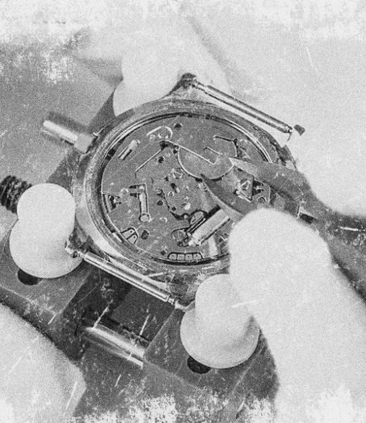 A quartz movement being serviced